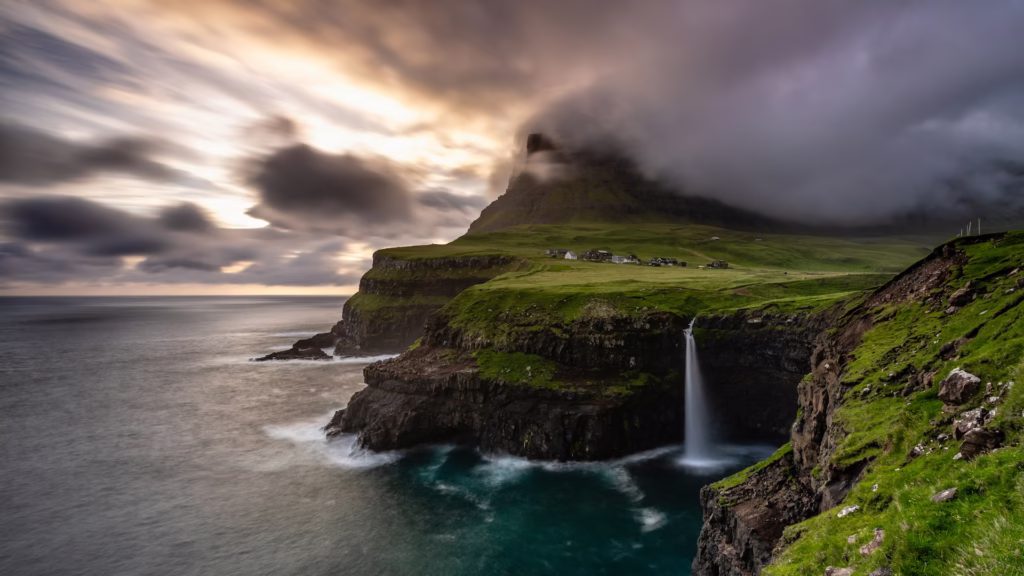 Waterfall tumbling into the sea at Gasadalur, Faroe Islands 